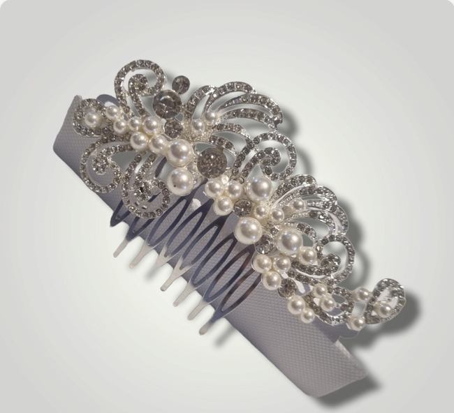 small silver and pearl comb